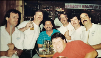 A group of men posing for a photo

AI-generated content may be incorrect.